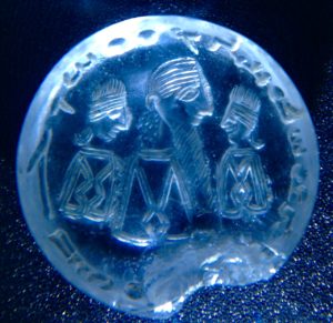 The seal of Mani, one of the few objects extant having belonged to Mani, here shown in the company of two of his close followers. The text is engraved on the edge of the seal, starting on the lower right and continuing around the outer edge. The inscription, in Aramaic and written in Aramaic script, from right to left: M’ny sh’liha d-Yso M’shiha - Mani, envoy of Isa Messiah (Jesus-Christ). (photo Christine Gruwez).